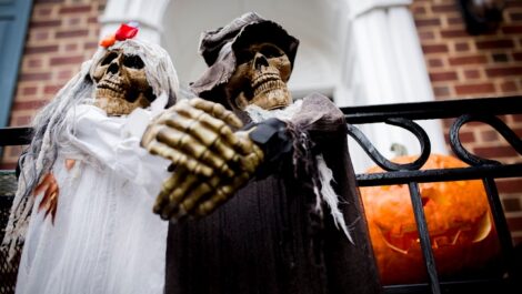 A close-up of Halloween decorations outside of a building.